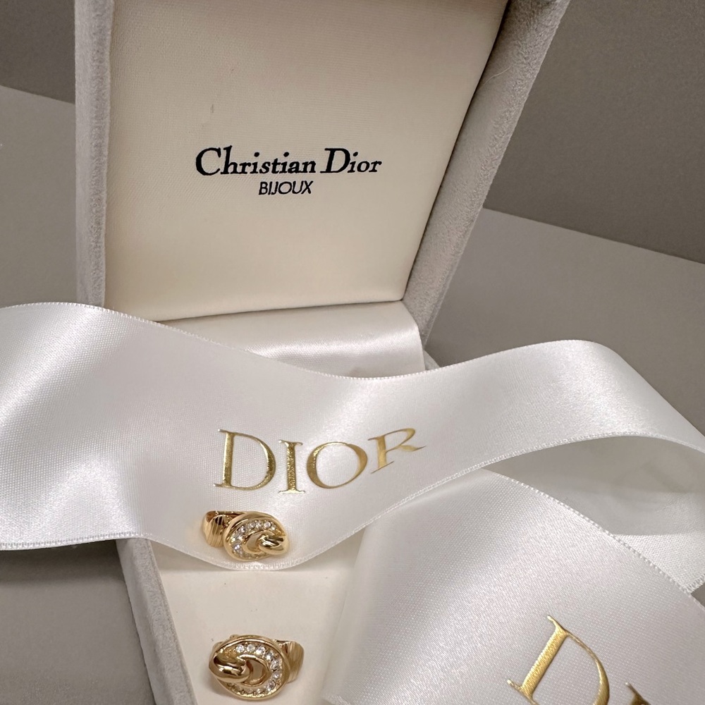 Christian Dior Buoux small clip on gold tone and rhinestone earrings.
